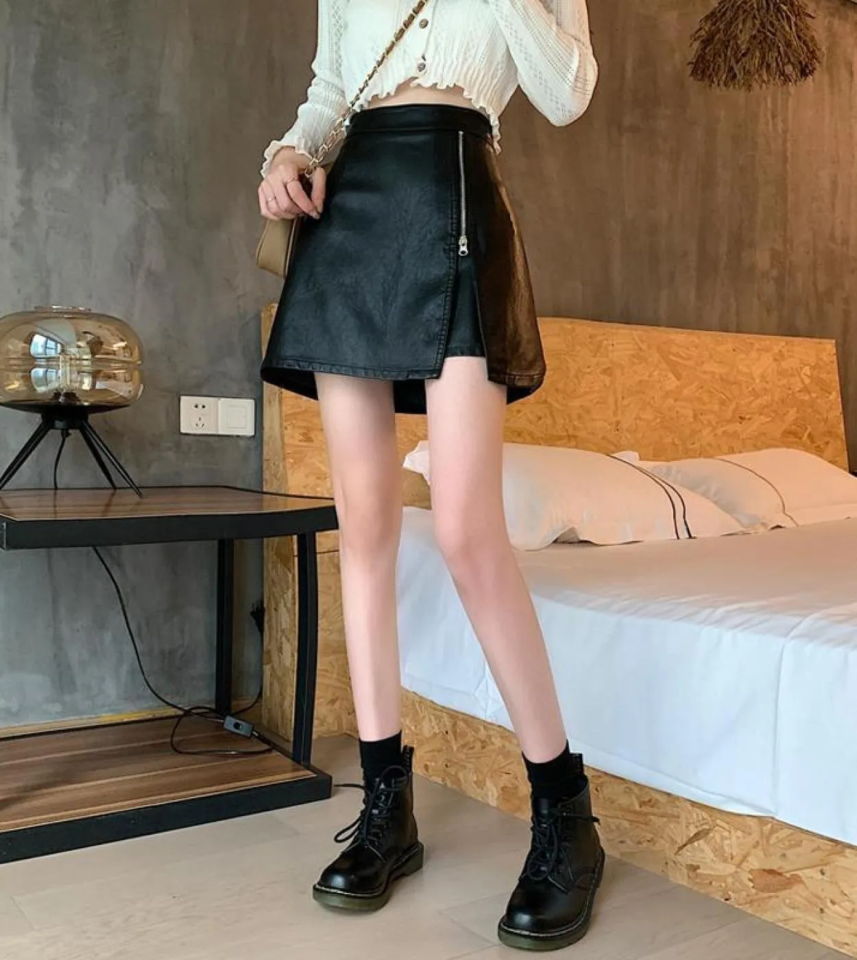 Gonne in pelle PU con cerniera laterale sottile nera Pantaloncini da donna 2022 Pantaloncini gonne corte da donna casual a vita